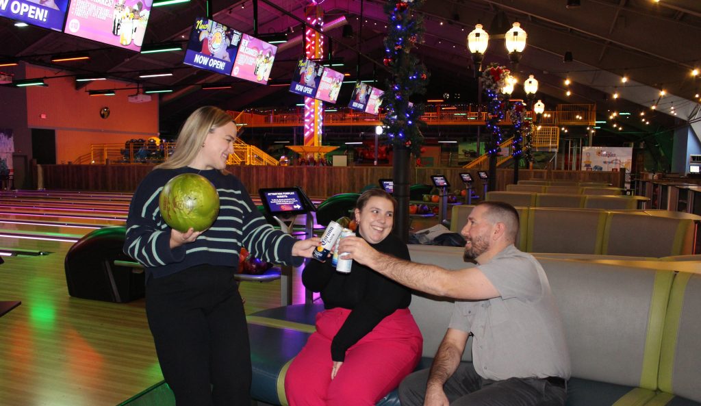 Cheers-ing drinks at Bowling during the Holidays, Corporate